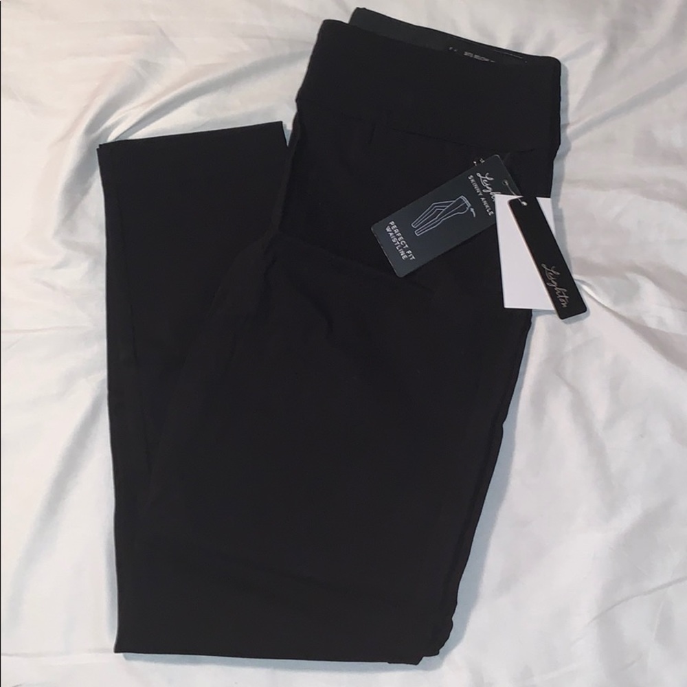 Full length, skinny ankle dress pants.